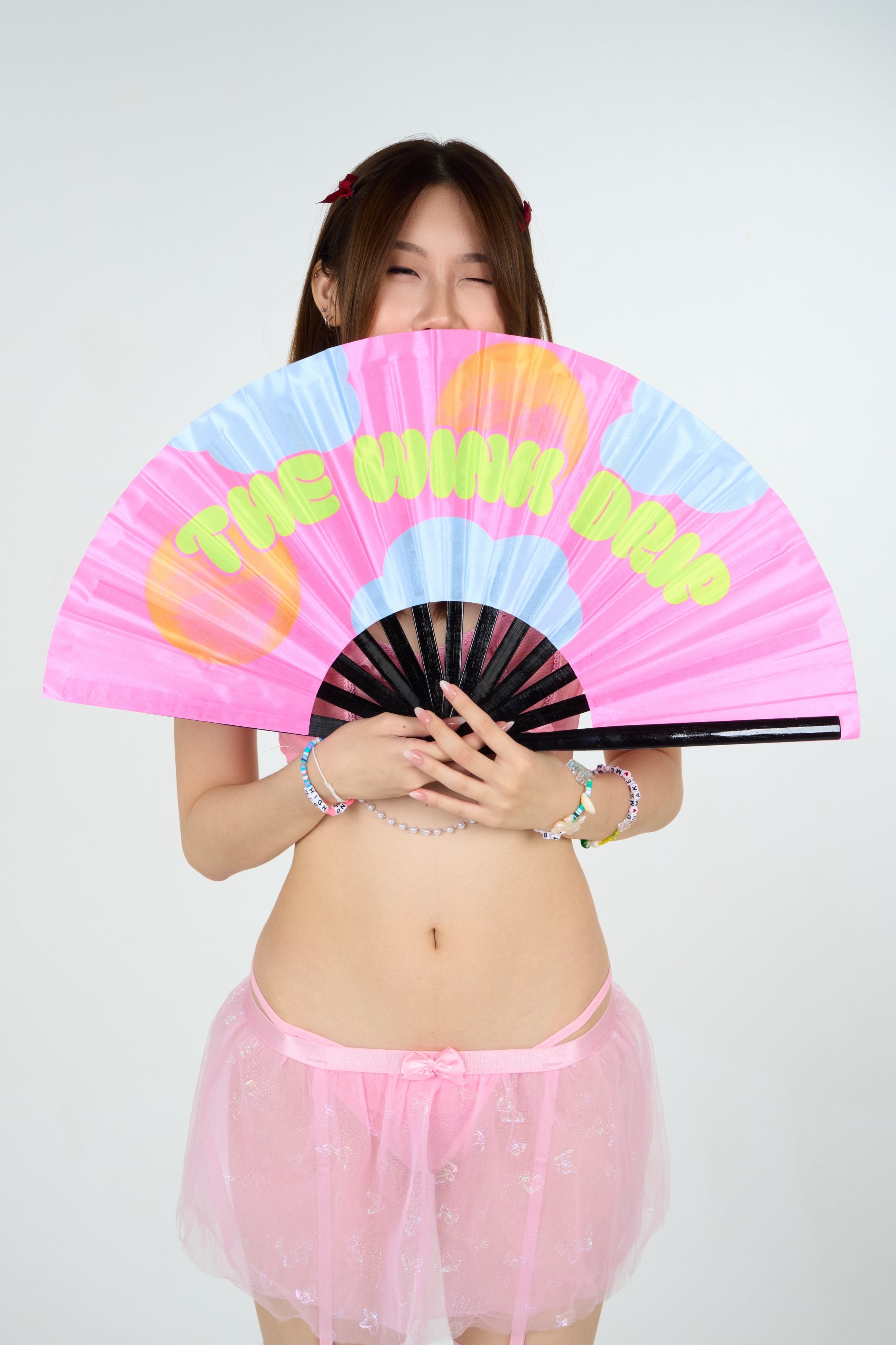 The Wink Drip Reflective Hand Fan
